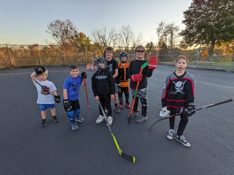 Kids gathered to play hockey in Halloween costumes
